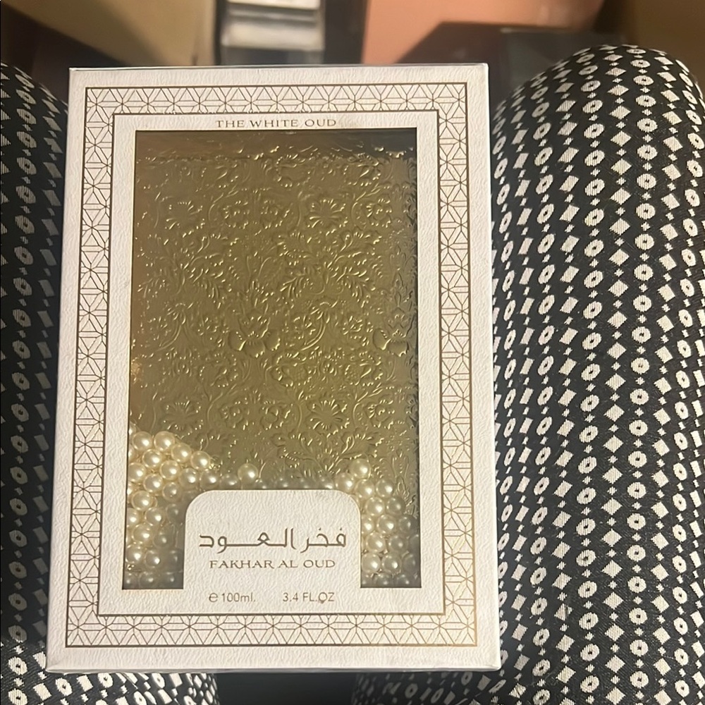The White Oud Perfume, 100ml, unopened.  Unisex. Beautiful packaging.